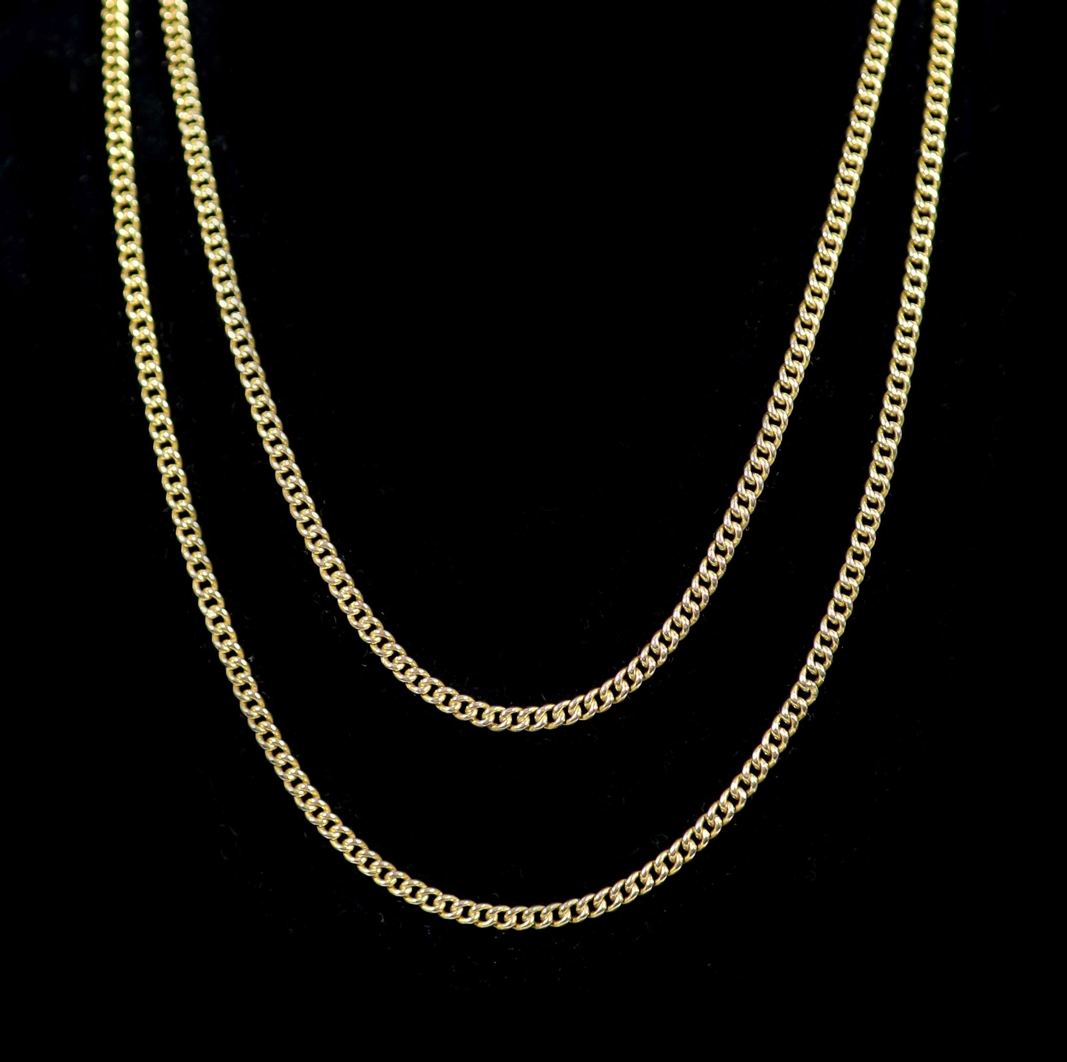 An early 20th century 15ct gold guard chain